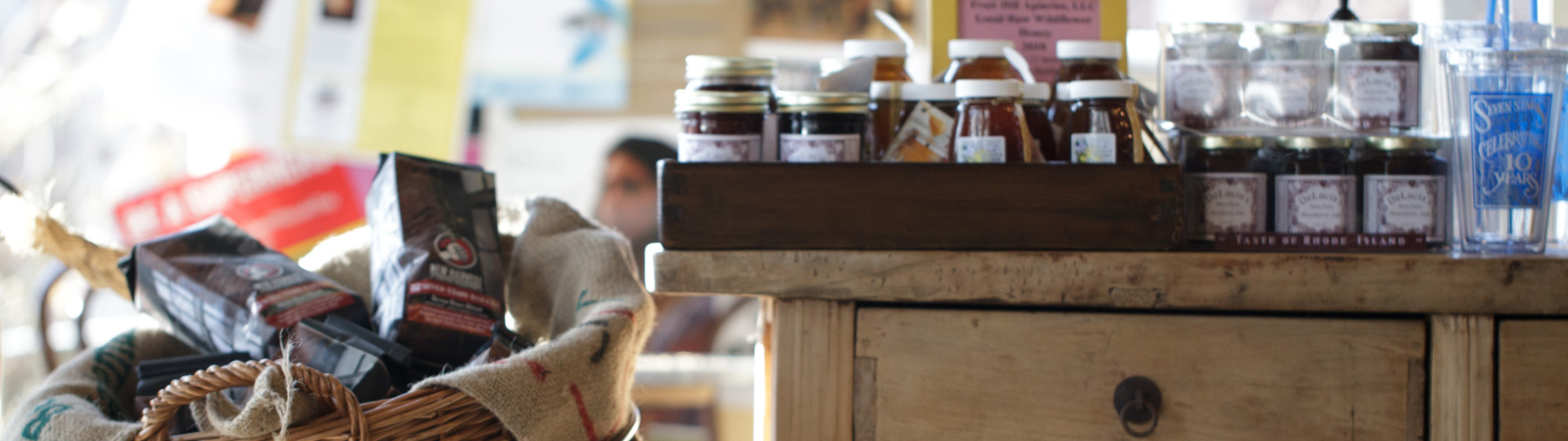 Coffee, jam, honey and other various products in baskets at Seven Stars Bakery.