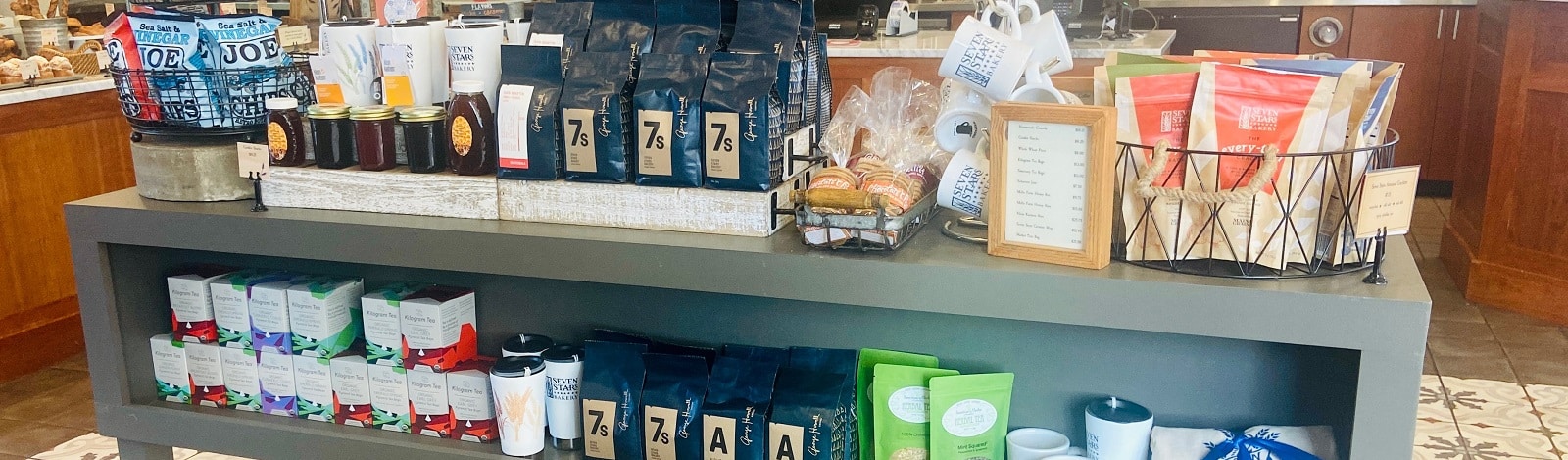 Products displayed on a table in the Seven Stars cafe.